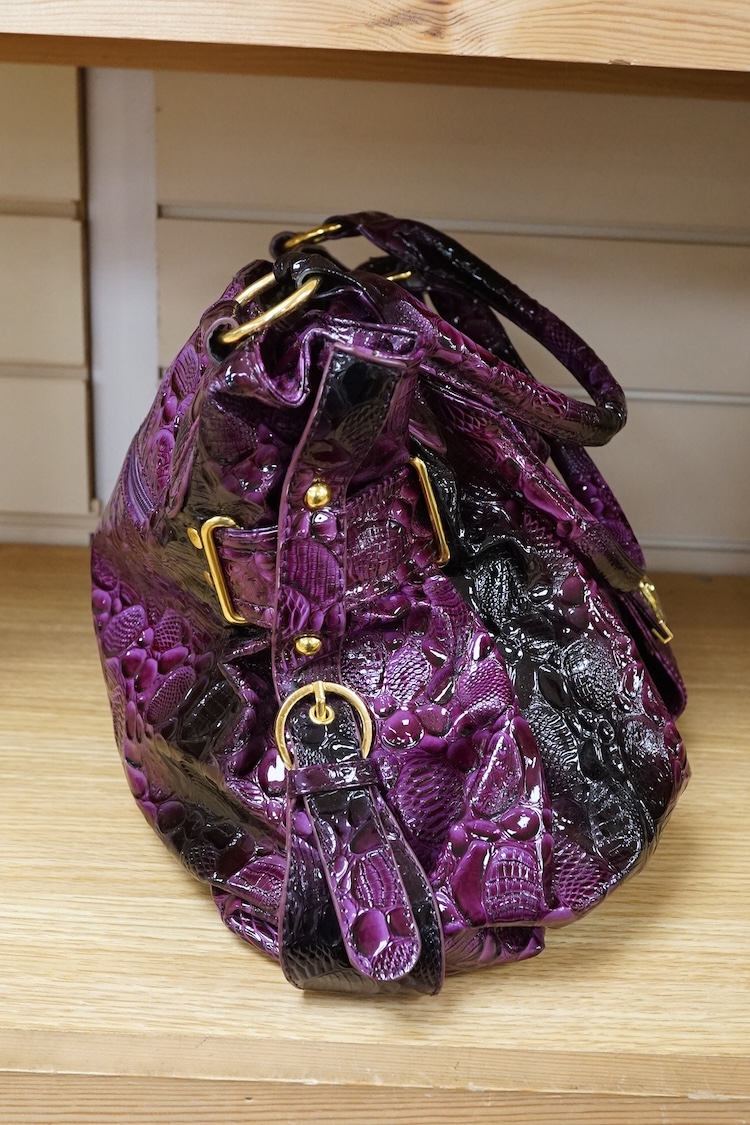 A purple patent Versace large handbag, approximately 41cm wide